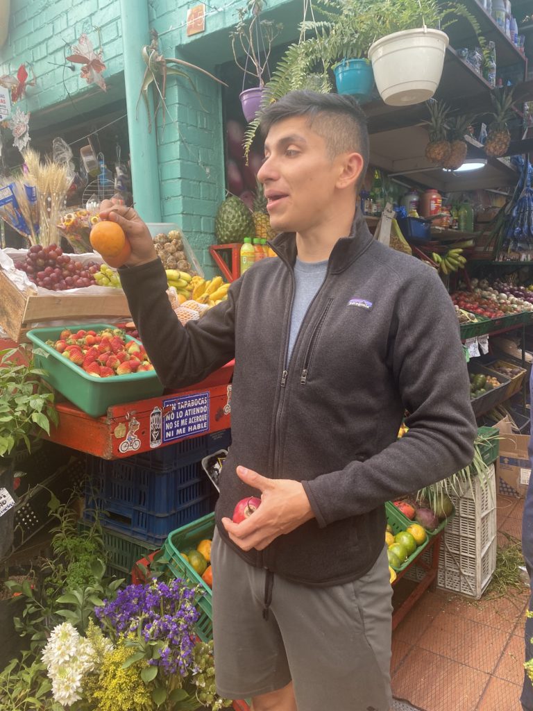 "Use your tongue wisely,” our guide Daniel said to us without a hint of sarcasm. So we did, using our tongue to grab all the sweet pulp of the giant yellow passion fruit without getting any of the white pith. Delicious and a little sweeter than the small purple variety we're used to; we were in a market laneway in central Bogotá trying tropical fruit we'd never seen before.